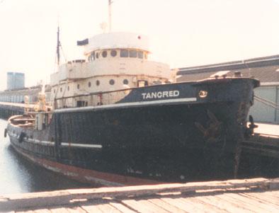 Tug "Tancred", built in 1943 by Gulf port boiler and welding works inc. Port Arthur, Texas, USA.  Ex HMAS Tancred 47.  Bat 1344.  Diesel vessel with a Gross tonnage of 505.  Operated in the Pacific Theatre in the final years of World War 2, recovering gro