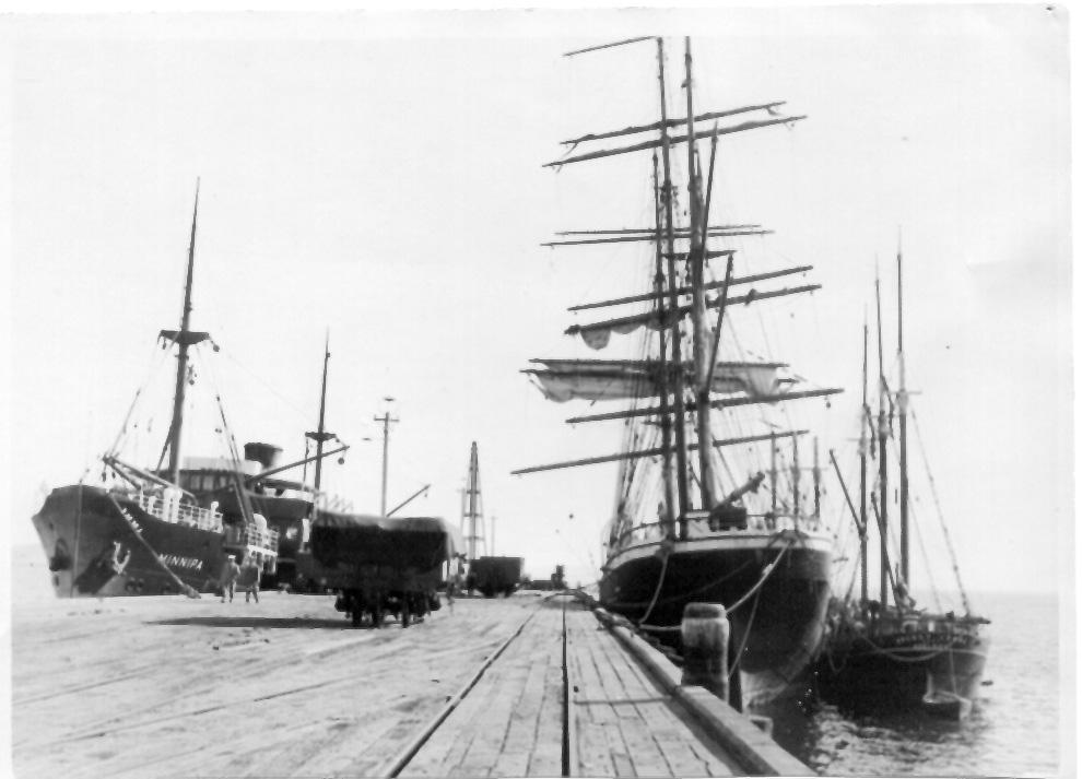 This image also shows the German steel 4 masted Barque "Parma and the Port Adelaide ketch "Argosy Lemal" at Port Lincoln, South Australia.