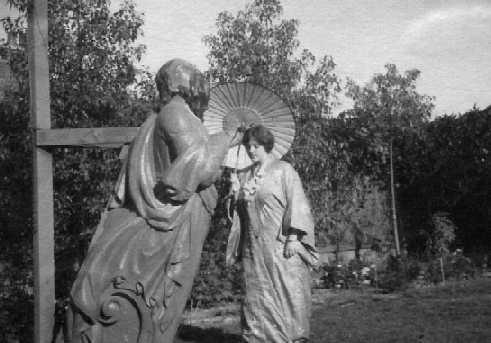 Figurehead of ship shown in grounds of house in 1934, later donated to Museum.