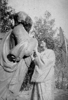 Figurehead of ship shown in grounds of house in 1934, later donated to Museum.
