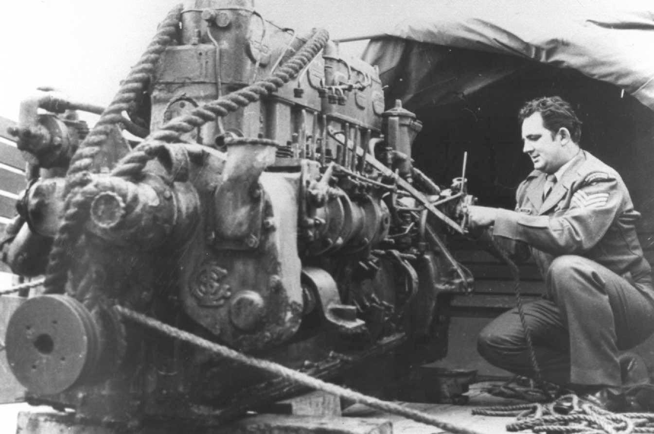 This image shows the army removing her engine.