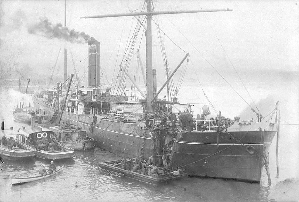 Freighter, S.S. "Argus", built in 1889 at Newcastle, UK, and employed in Australia to India trade.  Owned from 1889 unitl 1905 by Archibald Currie, then sold into Japan.  Vessel has a gross tonnage of 2792.

This image shows vessel  ashore at Goat Islan