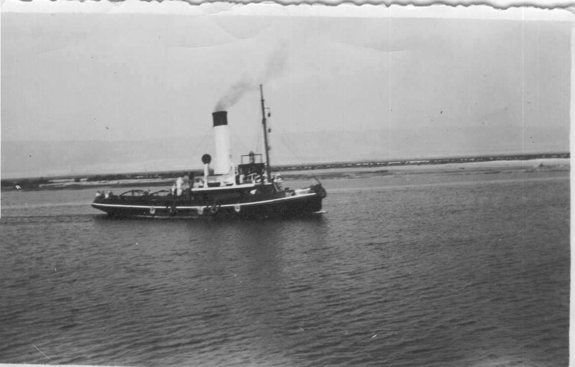 Tug entering port