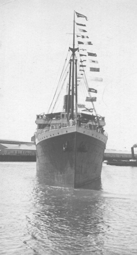 1909 passenger vessel.
This image shows vessel leaving Port Adelaide under tow from tug S.S. Falcon and with flags flying.