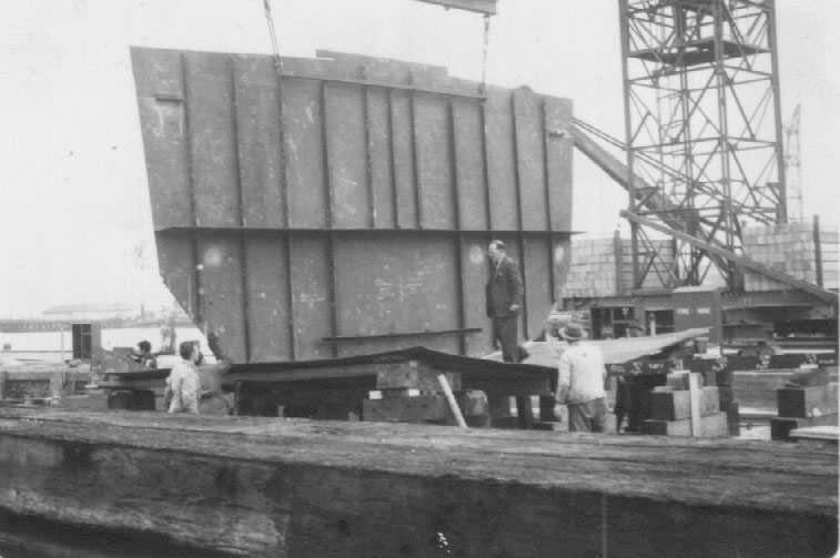 Starboard shell panel in position, 7/8/1958.