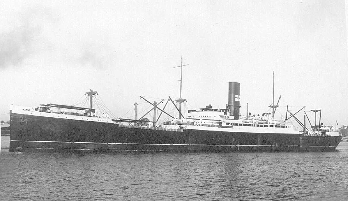 1915 Refrigerated cargo vessel in port