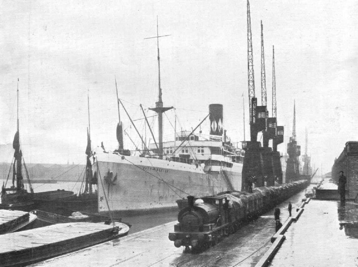 1914 passenger cargo vessel berthed