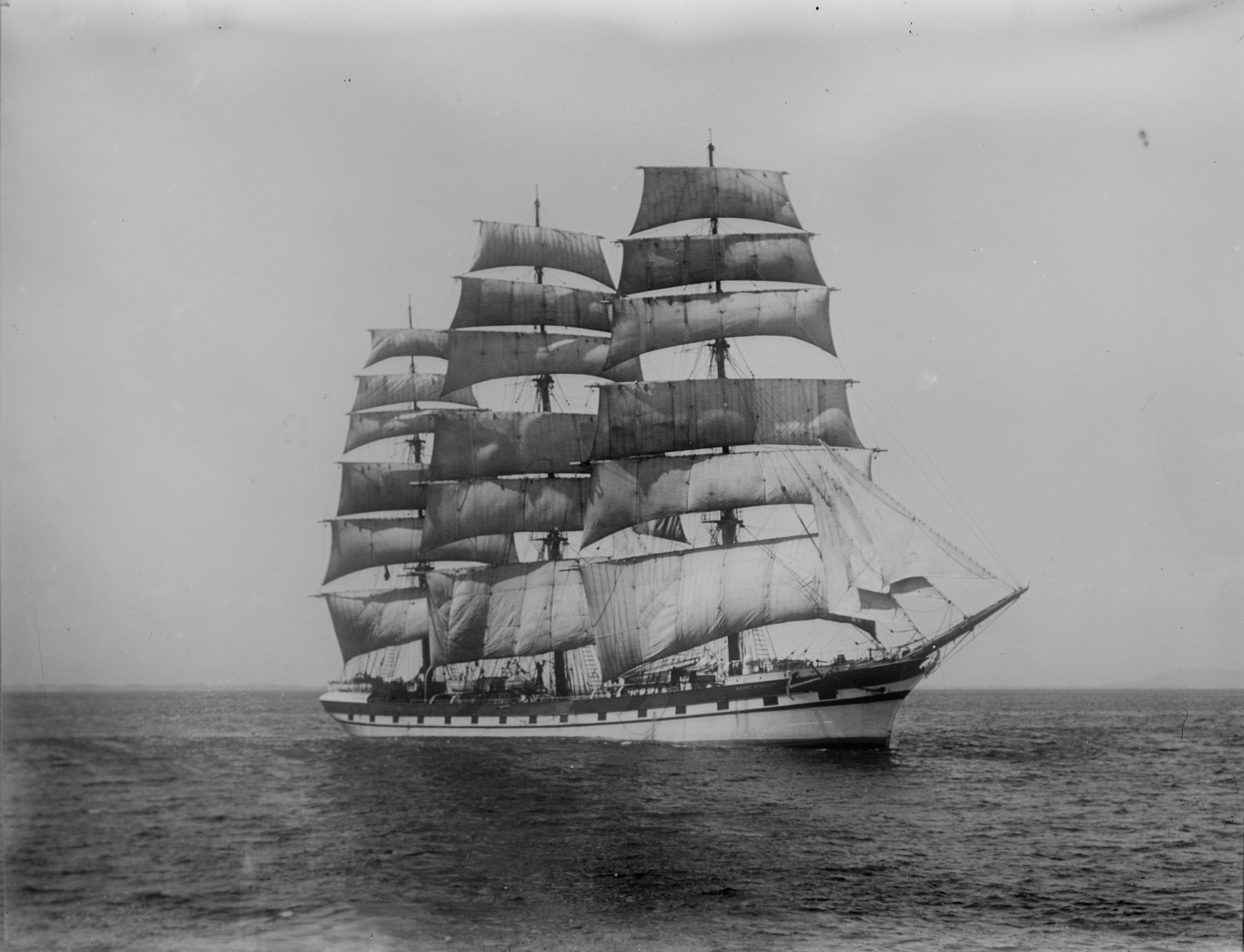 Image: Three masted full-rigged ship at sea