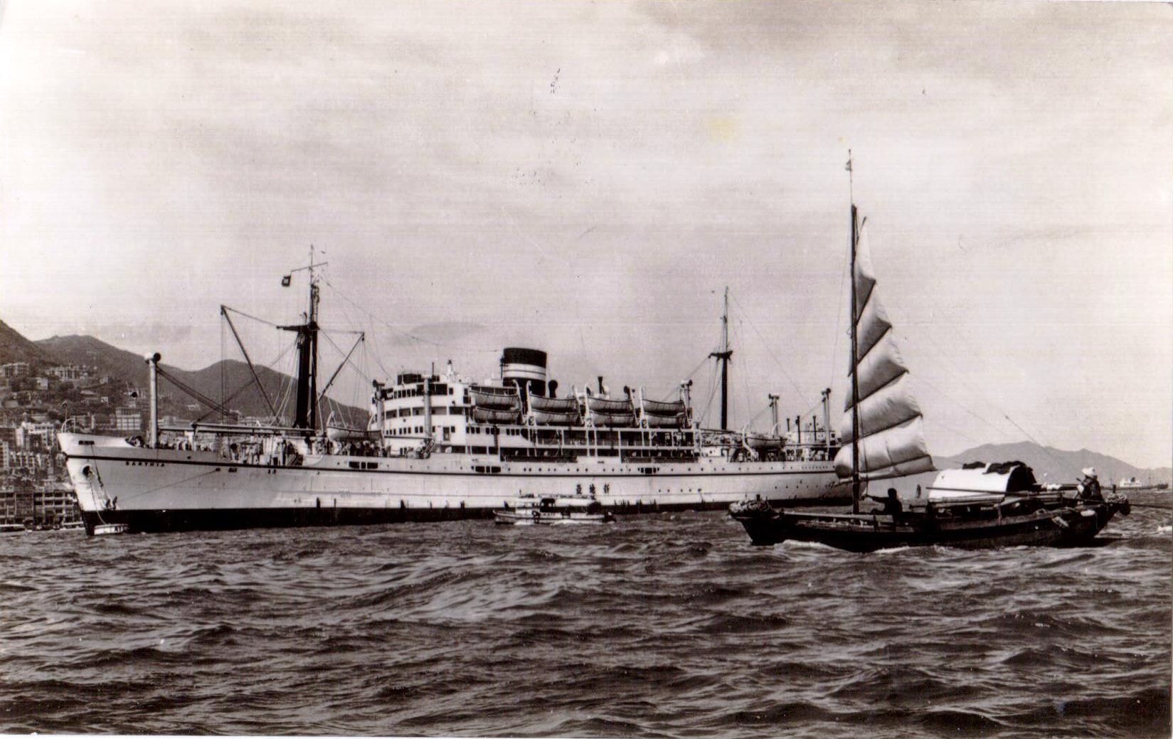 Image: Two masted ship with a funnel in the centre