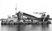 H C "Meyer", dredger, built in 1965 by GH and JA Watson in Sydney and weighing 1028 gross ton.  Vessel has a diesel motor and bucket dredge.  Vessel has a red hull and cream superstructure.