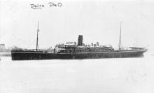 1905 passenger cargo vessel under tow