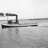 This image shows vessel trying to free Steamer "Allara" after she ran aground, 10/1/1938.
