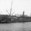 Passenger vessel "Somali", bult in 1901 at Greenock, by Caird & Co for P & O Steam Nav. Co.  A Steel twin screw steamship, seen here carrying with troops aboard during World War 1.
Official Number:  114056
Tonnage:  6712 gross
Dimensions:  length 450',