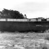 This image shows the hull of vessel on land, reading DANGER, KEEP OFF.