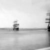 This image shows vessels at Port Lincoln, SA.  "Lawhill" beside the jetty and "Pamir" further out, January 1937.