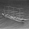Barque at anchor.  Purchased by Capt. Gustav Erikson of Mariehemn in 1919 for the Australian grain trade.  She was seized as a war prize in 1942 by the South African Government and made several trips for them.  Sold after World War II to Portuguese owners
