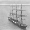 Barque at anchor.  Purchased by Capt. Erickson of Mariehamn, Finland, and used in the Australian grain trade.  She and "Pamir" were the last European owned sailing vessels to carry cargo from Australia: their last voyages were in 1949.  "Passat" is now a 