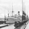 1914 passenger cargo vessel berthed
