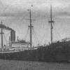 1929 General cargo vessel under tow