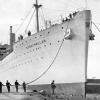 1938 passenger vessel entering Tilbury Dock.