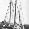 Wood and iron composite 3 masted schooner, built in1875 by HC Fletcher, Port adelaide as an iron riverine barge for HB Hughes.  Reregistered in Port Adelaide in March 1922 by RM Garnaut & others, later Fricker & Co Ltd & others (which from time to time in