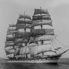 Image: Three masted full-rigged ship at sea